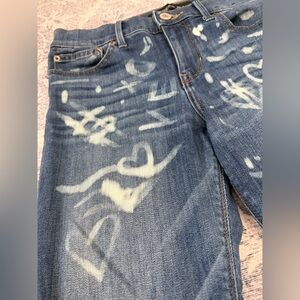 Express jeans with graffiti
